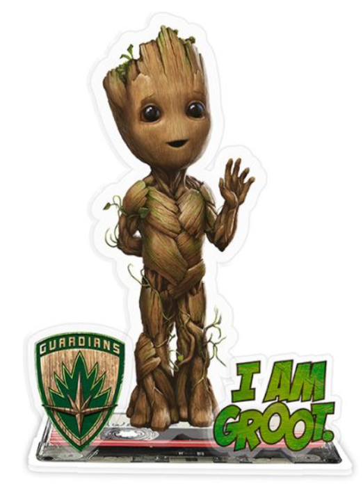 Image of a Baby Groot acrylic stand featuring the character from 'Guardians of the Galaxy'. Baby Groot is depicted standing with a friendly smile, raising his right hand in a waving gesture. Next to him is the Guardians of the Galaxy emblem and the text 'I AM GROOT' in bold green letters. The stand is designed to be a decorative collectible.