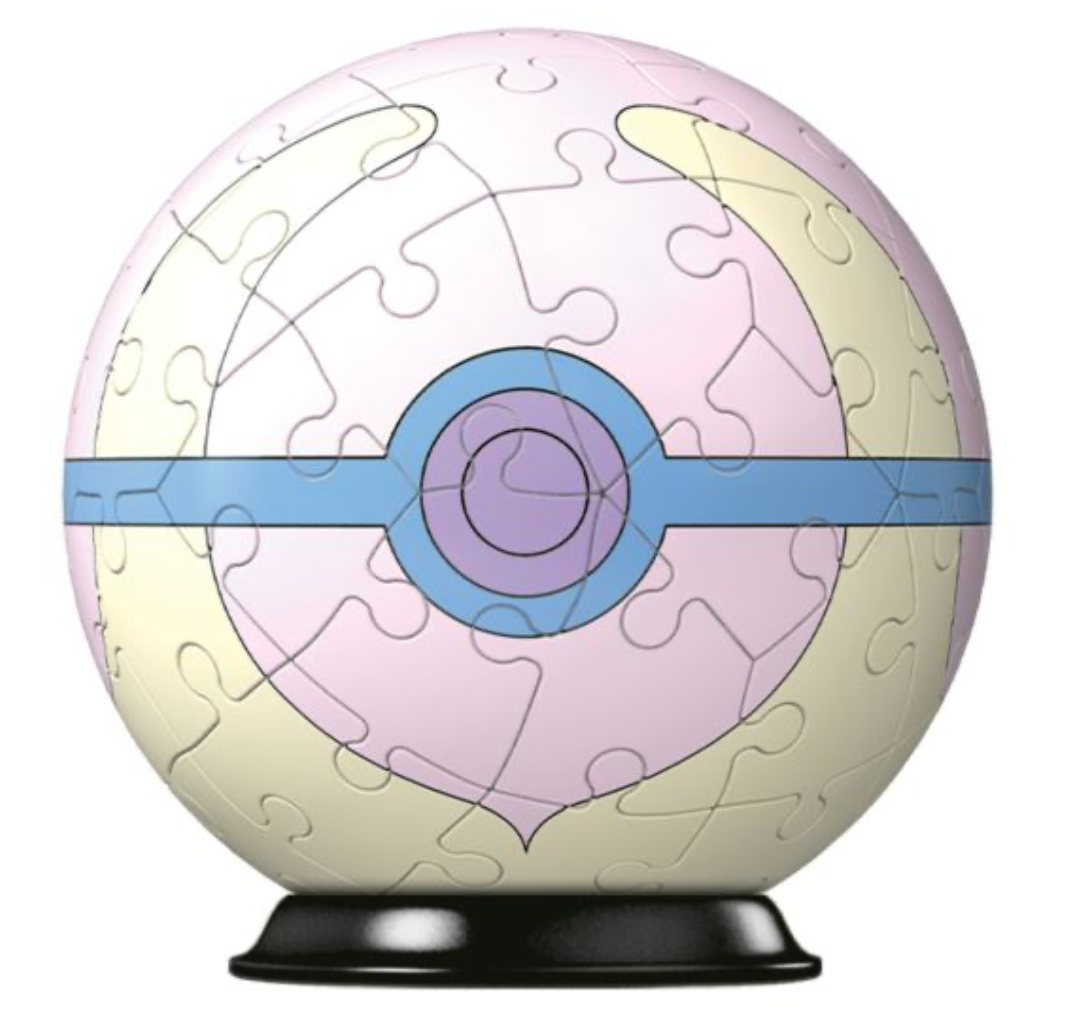 Close-up image of a Pokémon-themed 3D puzzle sphere resembling a Love Ball. The sphere features a pink and white color scheme with a blue horizontal band and a circular emblem in the center. The puzzle is mounted on a black stand, showcasing the intricate assembly of the puzzle pieces that form the sphere.